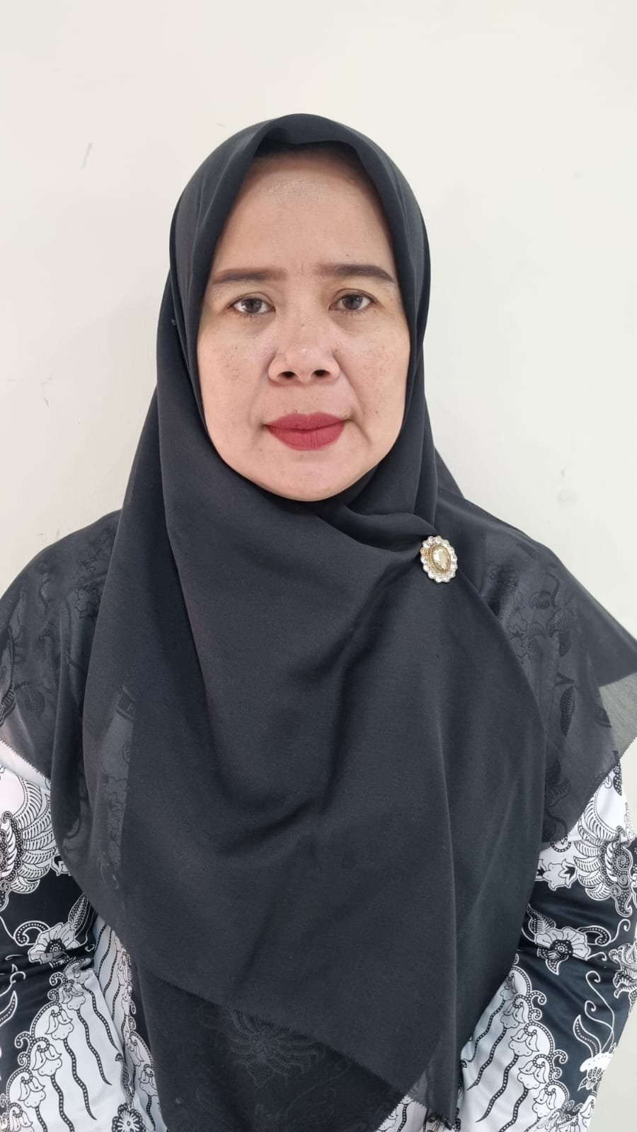 Hj. EKA SRI WAHYUNI  KADEWI, S.Pd., M.Pd